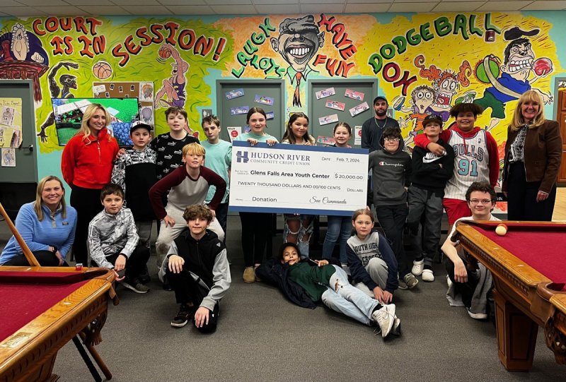 The Hudson River Community Credit Union presents the Glens Falls Area Youth Center with a check for $20,000. Photo provided by Adam Rossi.