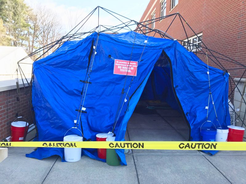 Specimen collection site for COVID-29 testing. The temporary biocontainment facility, located outside Alfred Z. Solomon Emergency Center on Myrtle Street, is the safest way to provide this service to the community. 