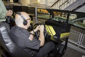 Sheriff Michael Zurlo on one of The Saratoga Automobile Museum’s distracted driving simulators