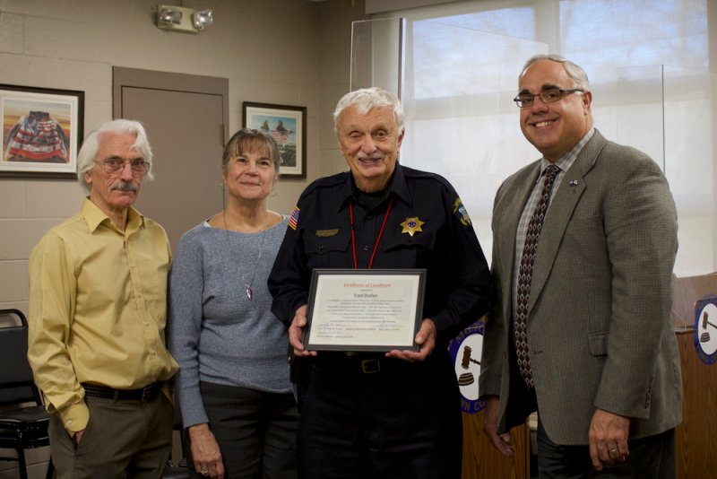 Fred was presented with a recognition award for his many years of service in the community at his 80th birthday party. (L to R): Justice John Cromie, Court Clerk Denise Swahlan, Fred Dreher, and Justice Tim Brown. Photo by Jaynie Ellis.
