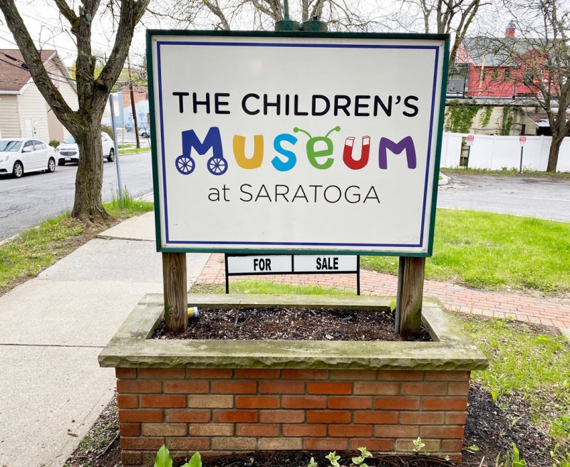 For Sale sign outside the Children’s Museum at Saratoga at 69 Caroline Street, on May 10,2021. Photo by Thomas Dimopoulos.