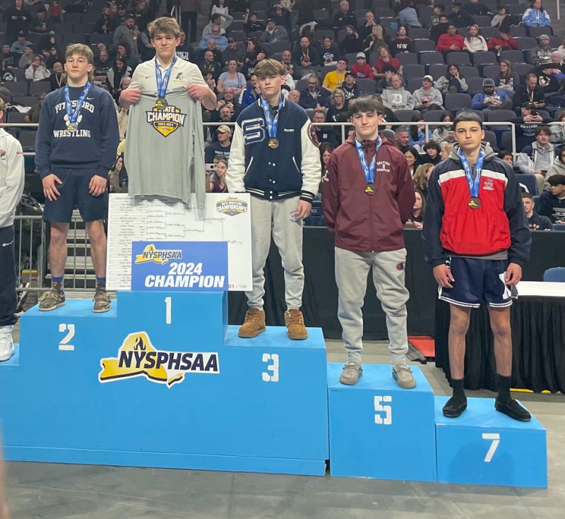 Saratoga Springs varsity wrestler Taylor Beaury poses on the 3rd place podium at the New York State Public High School Athletic Association championships last weekend. Photo by Coach Jake Zanetti. 
