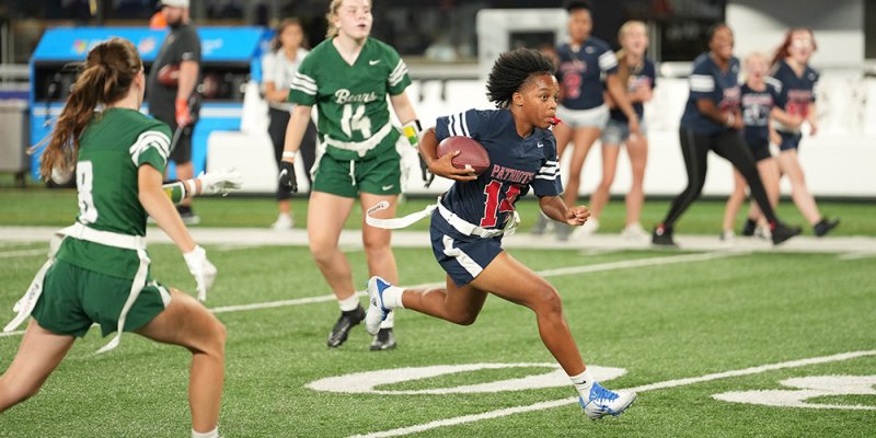 Photo of a girls’ flag football game via the New York State Public High School Athletic Association website.