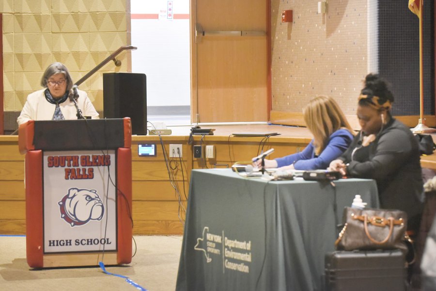 A woman delivers prepared remarks regarding the Saratoga Biochar project at a February 8 public hearing at South Glens Falls High School. Photo by Super Source Media Studios.