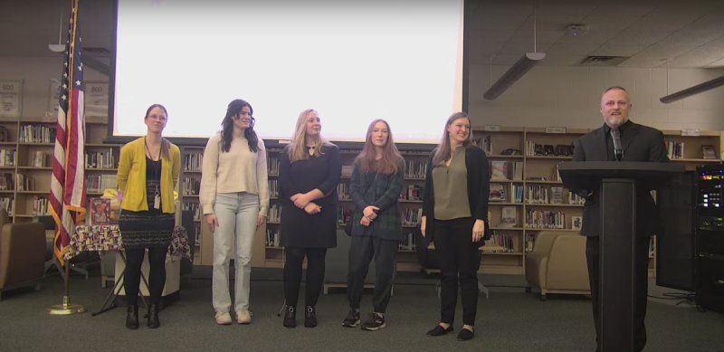 Ballston Spa music students pose for photos while being formally recognized by the district’s Board of Education at a meeting on March 6. Images via the Ballston Spa Board of Education livestream. 